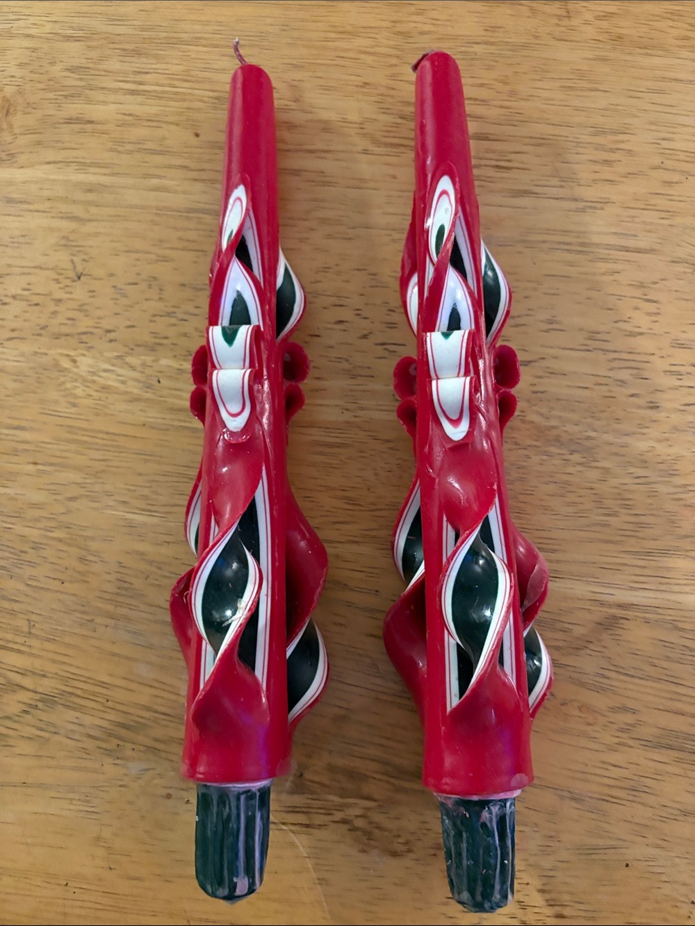 Carved Swirl Red Taper Candle Pair with Green and White Accents Christmas
